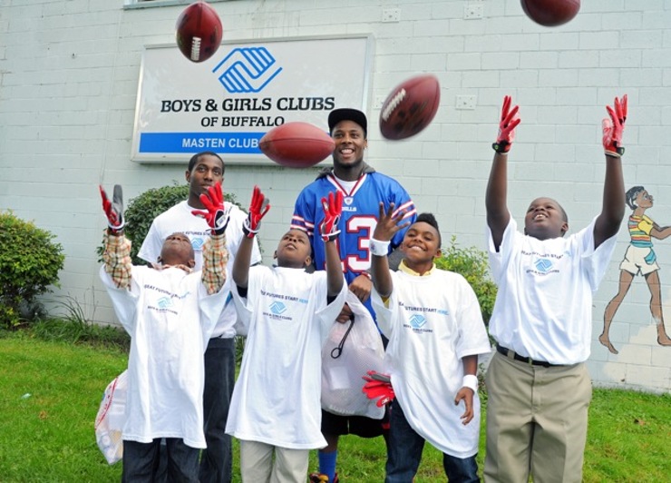 Buffalo Bills star wide receiver Stevie Johnson hands out football gear