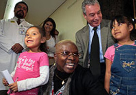 Angelique Kidjo surrounded by children at the Iztapalapa Paediatric Hospital in Mexico City, Mexico.