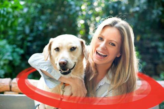 Kristin Bauer, pictured with her labrador retriever Ozmand, proudly supports WSPA's Collars Not Cruelty campaign