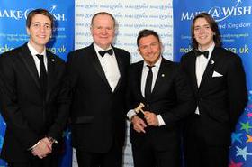 Make-A-Wish Chief Executive Neil Jones with Jamie Breese and James & Oliver Phelps 