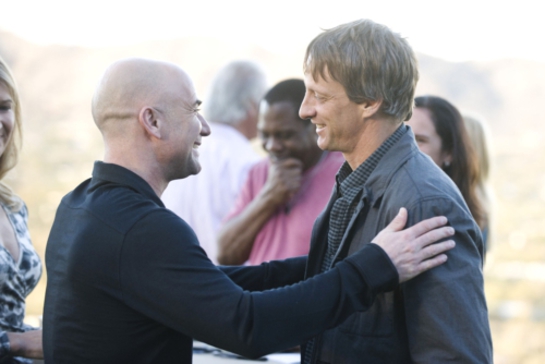 Andre Agassi greets skateboard legend Tony Hawk at philanthropic boot camp Andre Agassi greets skateboard legend Tony Hawk at philanthropic boot camp