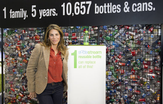 Jillian Michaels in front of Cage Exhibit