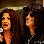 Slash Presents Charity Check At GuitarTown Launch