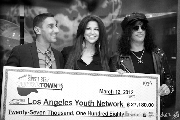 Perla and Slash Present Charity Check