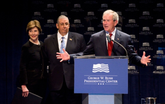 George W. Bush is joined by Mrs. Laura Bush and Dr. Angel Garrido at the launch of the Bush Center's Freedom Collection in Dallas