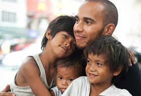 Lewis spent time with 3 brothers, Reynold (10), Arnold (9) and Rico (2) who live on the streets in the Binondo part of the city. Lewis spent time with 3 brothers, Reynold (10), Arnold (9) and Rico (2) who live on the streets in the Binondo part of the city.