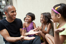 Lewis meets Jasmine, Sally and Mary Jo, (left to right) who all live with their families on the city's streets.