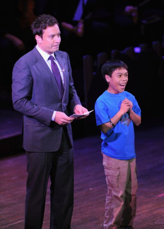 Jimmy Fallon performs with a Hole In the Wall camper during a Celebration of Paul Newman's Dream to Benefit the SeriousFun Children's Network 