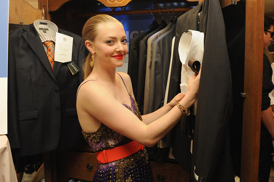 Amanda Seyfried selected a Kenneth Cole black suit, a classic Jones of New York white shirt and finished the look off with a gray and orange herringbone tie at the 66th Annual Tony Awards Backstage Creations Celebrity Retreat.