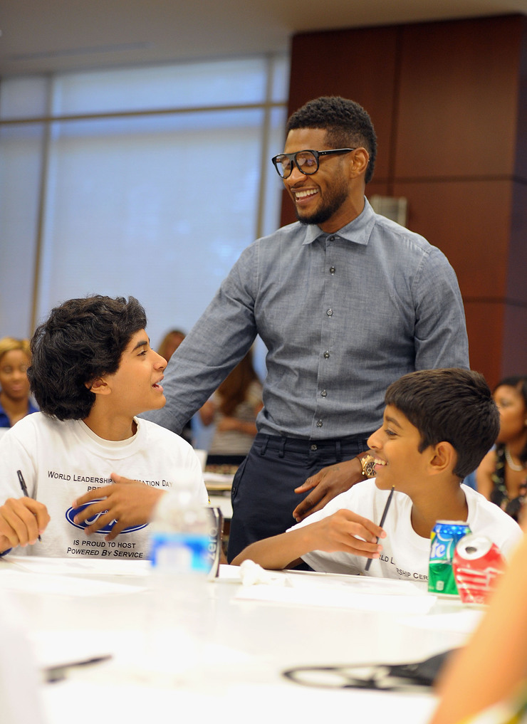 Usher visits with New Look youth