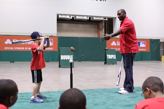 Phillies slugger Ryan Howard shares expert hitting tips with kids from Kansas City-area Boys & Girls Clubs during a baseball clinic hosted by State Farm prior to the 2012 State Farm Home Run Derby. 
