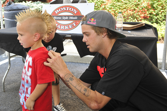 Ryan Sheckler meets with fans Jake Cooke, left, and Kyle Cooke at Boston Market