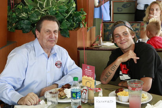 Boston Market CEO George Michel (A.K.A. The Big Chicken) and pro skateboarder Ryan Sheckler enjoy lunch at Boston Market Boston Market CEO George Michel (A.K.A. The Big Chicken) and pro skateboarder Ryan Sheckler enjoy lunch at Boston Market