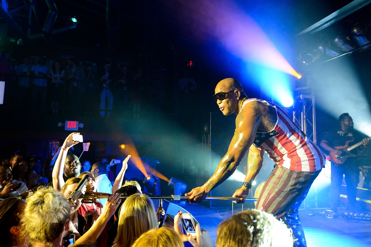Flo Rida getting some help from the crowd during his performance at the Got Your 6 and Lifetime TV Event