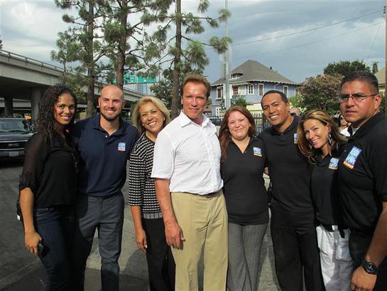 Arnold Schwarzenegger pictured with All-Star executives and staff members. Arnold Schwarzenegger pictured with All-Star executives and staff members.