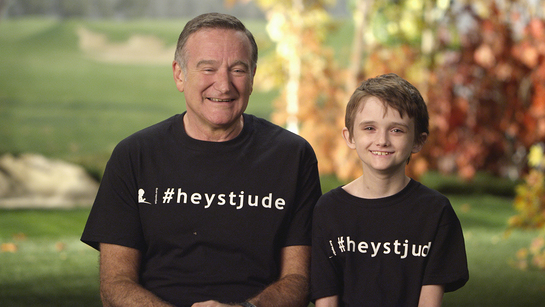 Robin Williams and St. Jude patient Brennan share a laugh while filming the new Hey Jude video. 