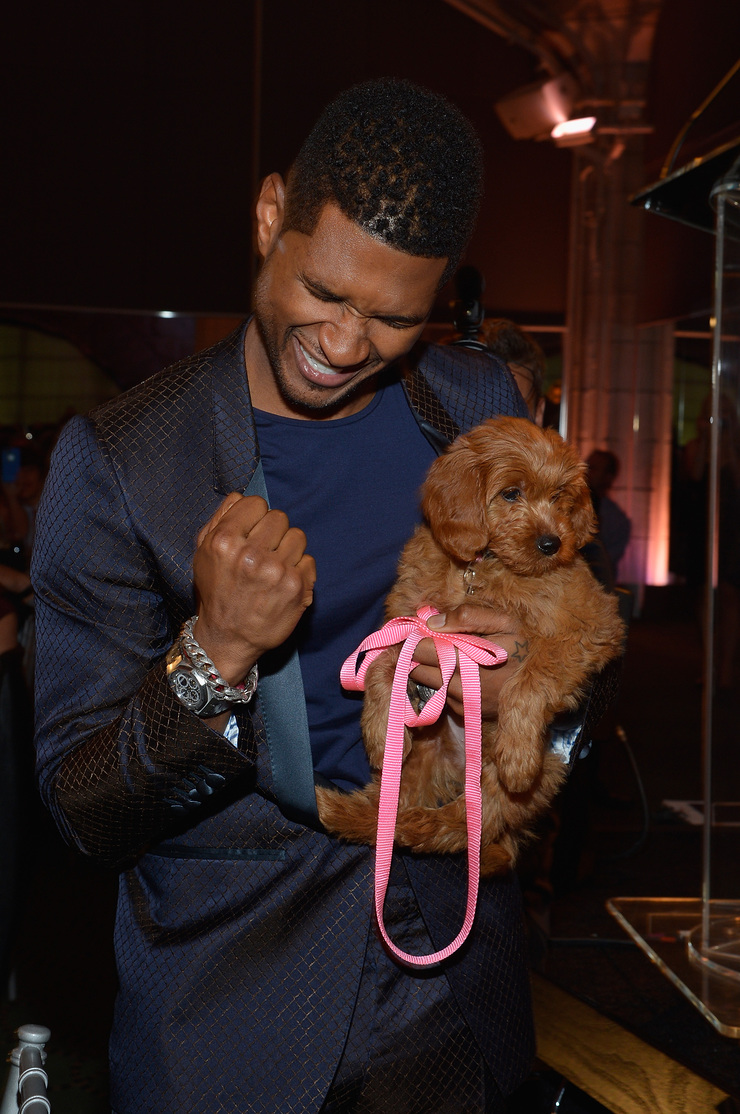 Usher and friend at Pencils of Promise Gala