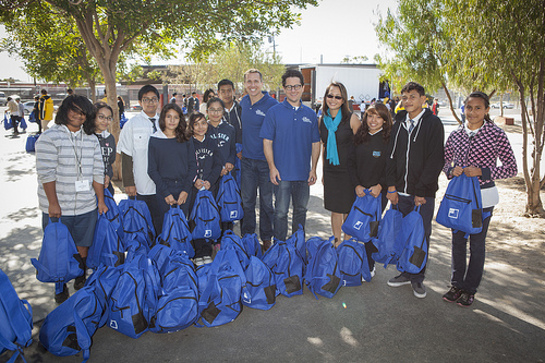 Eric Greitens, CEO of The Mission Continues, and JJ Abrams with local LA children after handing out the backpacks filled at the Got Your 6 and The Mission Continues Service Project Event
