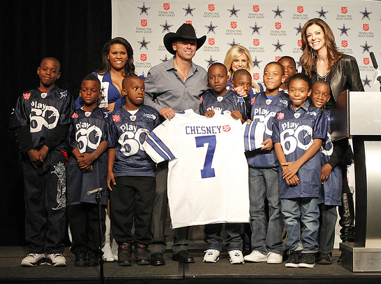 Kenny Chesney announces his halftime performance during the Dallas Cowboys Thanksgiving Day game to kickoff The Salvation Army Red Kettle Campaign. 