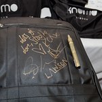 JLS And McFly Sign Suitcase Of Goodies For Charity Auction