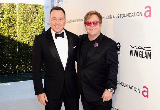 David Furnish and Sir Elton John attend Chopard at 21st Annual Elton John AIDS Foundation Academy Awards Viewing Party