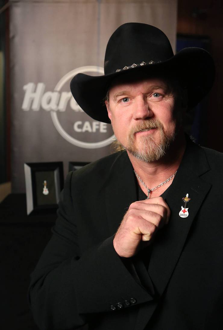 Adkins revealed Hard Rock's limited-edition Red Cross Pin, with a portion of the retail price benefiting the American Red Cross.
