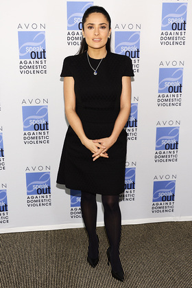 Salma Hayek Pinault wears the new Avon Empowerment Charm Necklace to raise funds to end domestic violence in honor of International Women's Day.