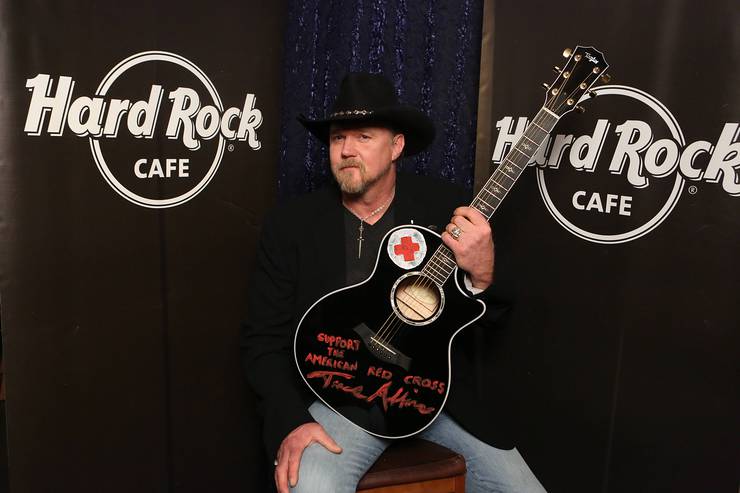 Trace Adkins, donates his hand-painted black Taylor guitar with the globally recognized symbol of the American Red Cross to Hard Rock’s world famous memorabilia collection as part of the most recent challenge on NBC’s All-Star Celebrity Apprentice