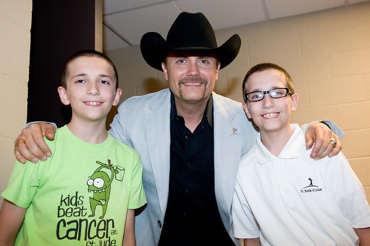 John Rich with St. Jude patient Ethan and his twin brother Cooper