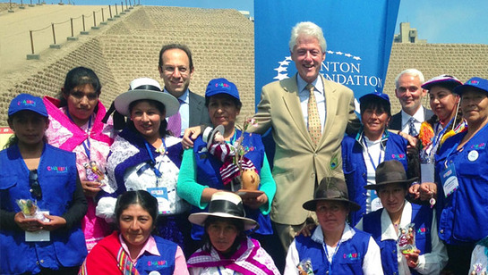 President Clinton, Frank Giustra, and Marco A. Slim in Peru with female entrepreneurs who will benefit from the Clinton Foundation's new program