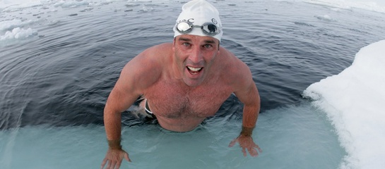 Lewis Pugh swam across an open patch of sea at the North Pole to highlight the melting of the Arctic sea ice