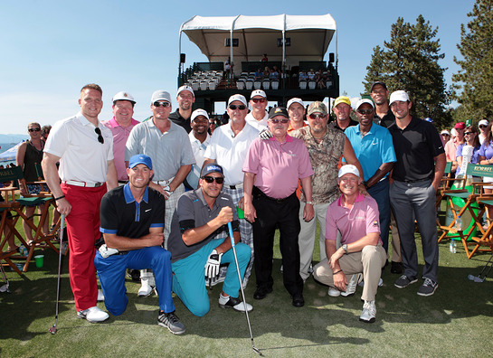 Sports and entertainment superstars pose with Korbel California Champagne owner and president Gary Heck during the second annual Korbel Celebrity Hole-In-One contest in Lake Tahoe