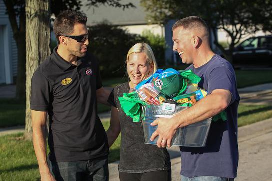 Eckrich and NASCAR driver Aric Almirola surprise active duty military member Howard Kott and his wife, Dawn, at their Ann Arbor home. Eckrich and NASCAR driver Aric Almirola surprise active duty military member Howard Kott and his wife, Dawn, at their Ann Arbor home.
