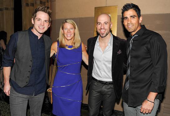 Save the Children president and CEO Carolyn Miles with members of musical group Daughtry.