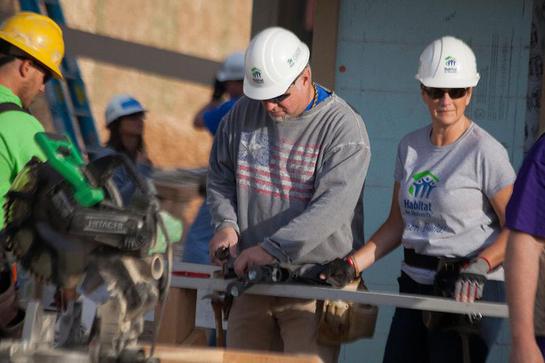 Garth Brooks and Trisha Yearwood joined President and Mrs. Carter and nearly 3,000 volunteers this week for Habitat for Humanity's 30th annual Jimmy and Rosalynn Carter Work Project. 