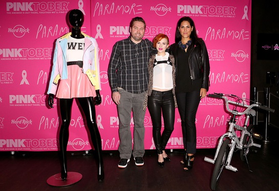 Hayley Williams appears with Sabrina Dupré, Chief Communications & Engagement Officer for The Breast Cancer Research Foundation and James Buell, Director of Music Relations for Hard Rock International