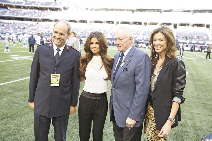 Selena Gomez joins Major Ron Busroe of The Salvation Army, Jerry Jones and Charlotte Jones Anderson of the Dallas Cowboys
