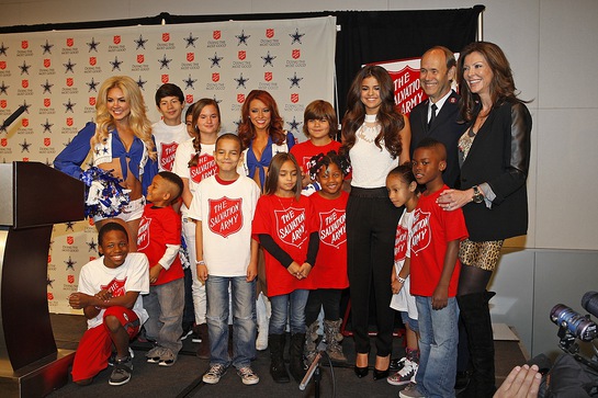 Selena hanging out with some of the children from The Salvation Army Arlington Corps