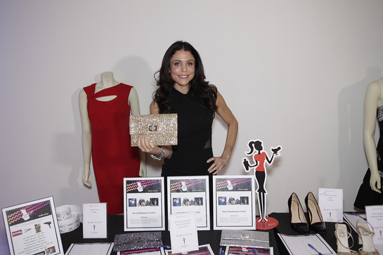 Bethenny Frankel proves that giving back is always in style as she donates three of her favorite clutches up for bidding at the Shop for Success VIP Party on Saturday, November 9, 2013 in New York City. 