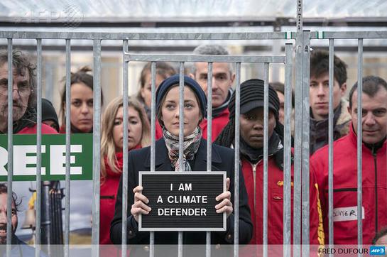 Marion Cotillard joins demonstration for release of the Arctic 30