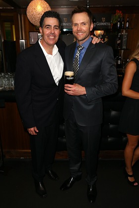 Joel McHale enjoys a pint of Guinness with Adam Carolla in the Green Room at Variety's Power of Comedy event Joel McHale enjoys a pint of Guinness with Adam Carolla in the Green Room at Variety's Power of Comedy event