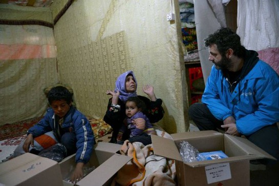 Michael meets ten-year-old Akram and his mum and niece.