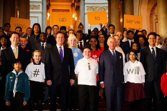 The Prince of Wales stands for a photograph with guests and political party leaders (left to right) Deputy Prime Minister Nick Clegg, Prime Minister David Cameron and Labour Leader Ed Miliband during the Step Up to Serve launch