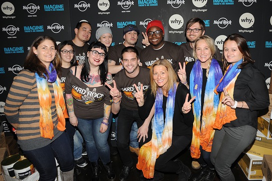 Lissie poses with Annie Balliro, Hard Rock's Senior Director of Brand Philanthropy, with WhyHunger representatives and Hard Rock Ambassadors 