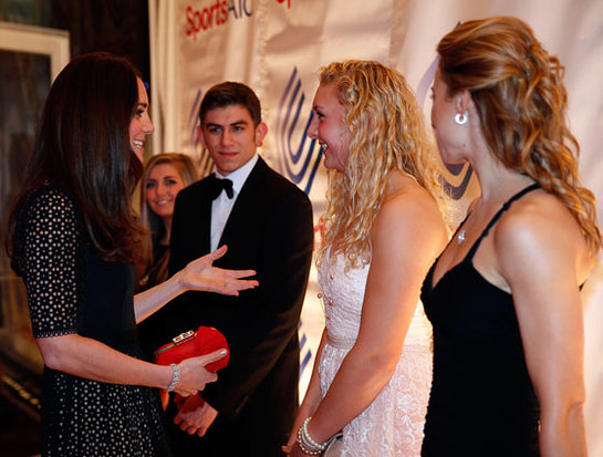 The Duchess of Cambridge meets British rower Jess Leyden, 18, (second right) as she attends the SportsAid SportsBall gala dinner