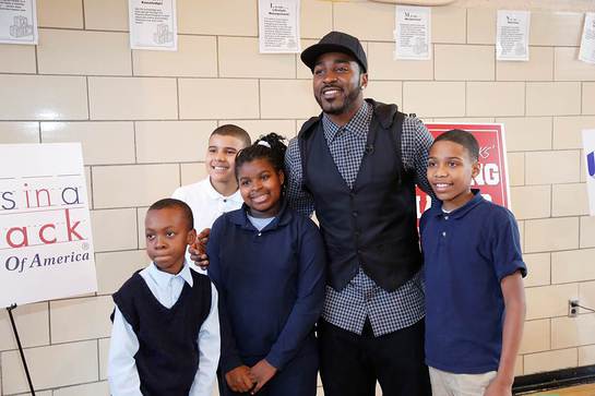 Hakeem Nicks with some of the students from PS 15 who participated in an afternoon of health education and physical fitness