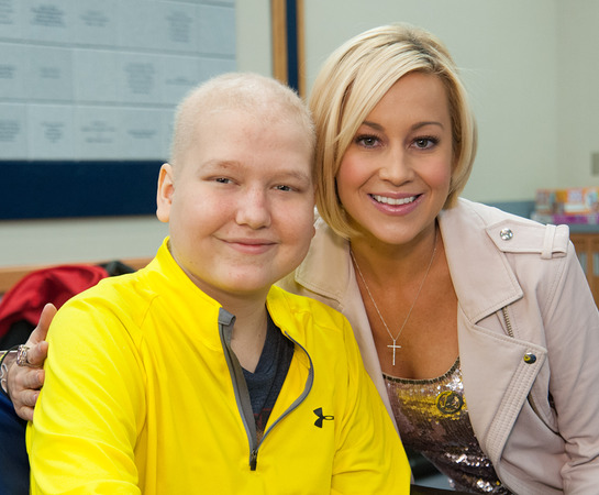 Kellie Pickler poses with St. Jude patient Parker during the Country Cares for St. Jude Kids Seminar. 