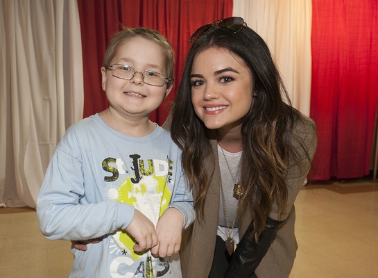 Country artist and Pretty Little Liars actress Lucy Hale and St. Jude patient Tyler played board games during the Country Cares Seminar. 