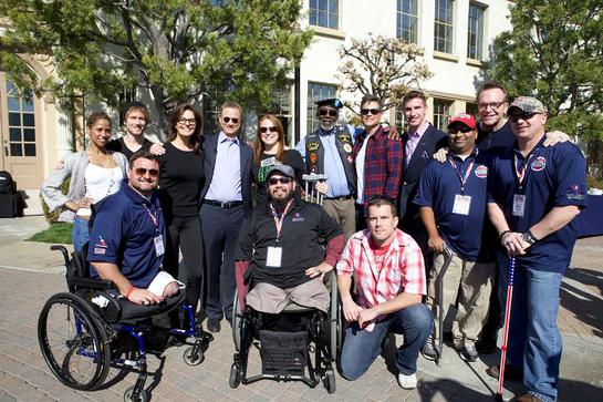 Gary Sinise (center) brought together celebrities (right to left) Tom Arnold, Rob Lowe, Sela Ward, Stacey Dash and more at Paramount Pictures Studio to honor wounded troops and veterans