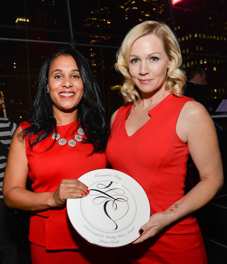 Jennie Garth, right, accepts the Campbell's Healthy Heart Award from Vice President - U.S. Soup for Campbell Soup Company, Leah Dunmore at the 2014 Woman's Day Red Dress Awards